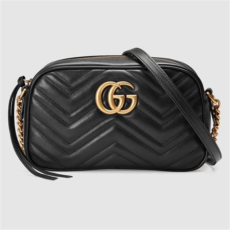 black gucci luggage bag